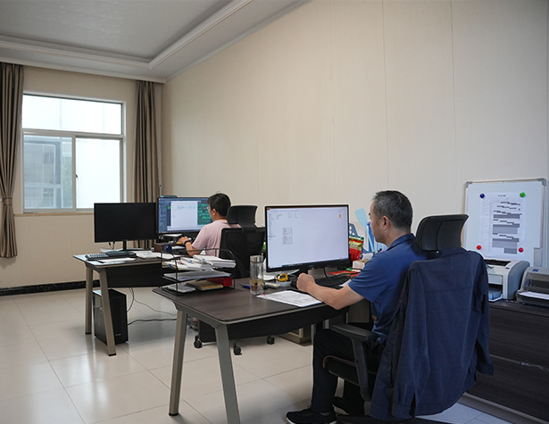 Engineers preparing transformer drawings and technical documentation