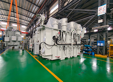 Large power transformers inside a production workshop