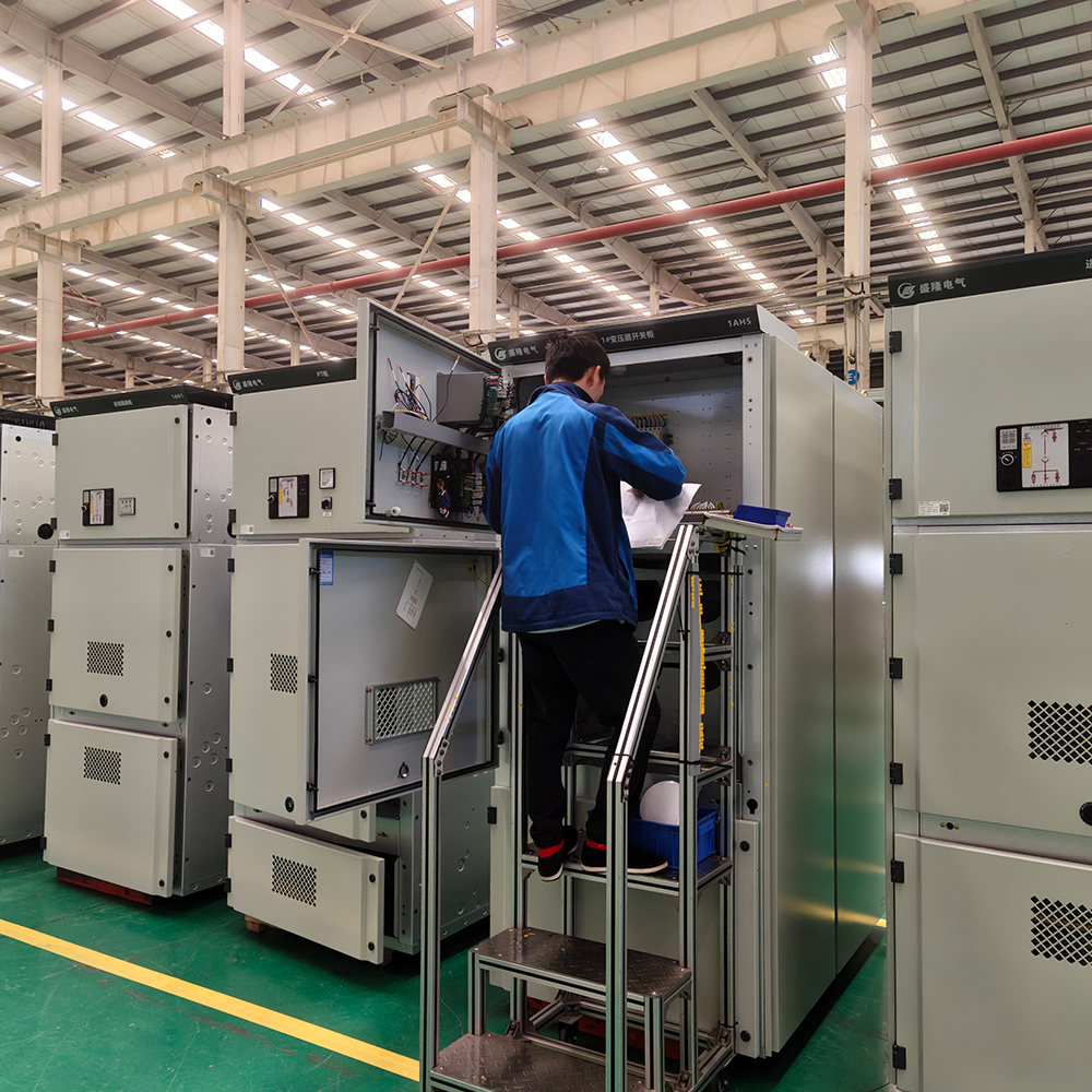 Technician integrating switchgear components in the workshop